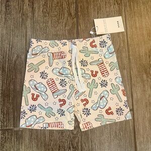 NWT rodeo swimsuit trunks.
